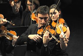 Photo d'un violoniste de l'Orchestre Melun Val de Seine - Agrandir l'image